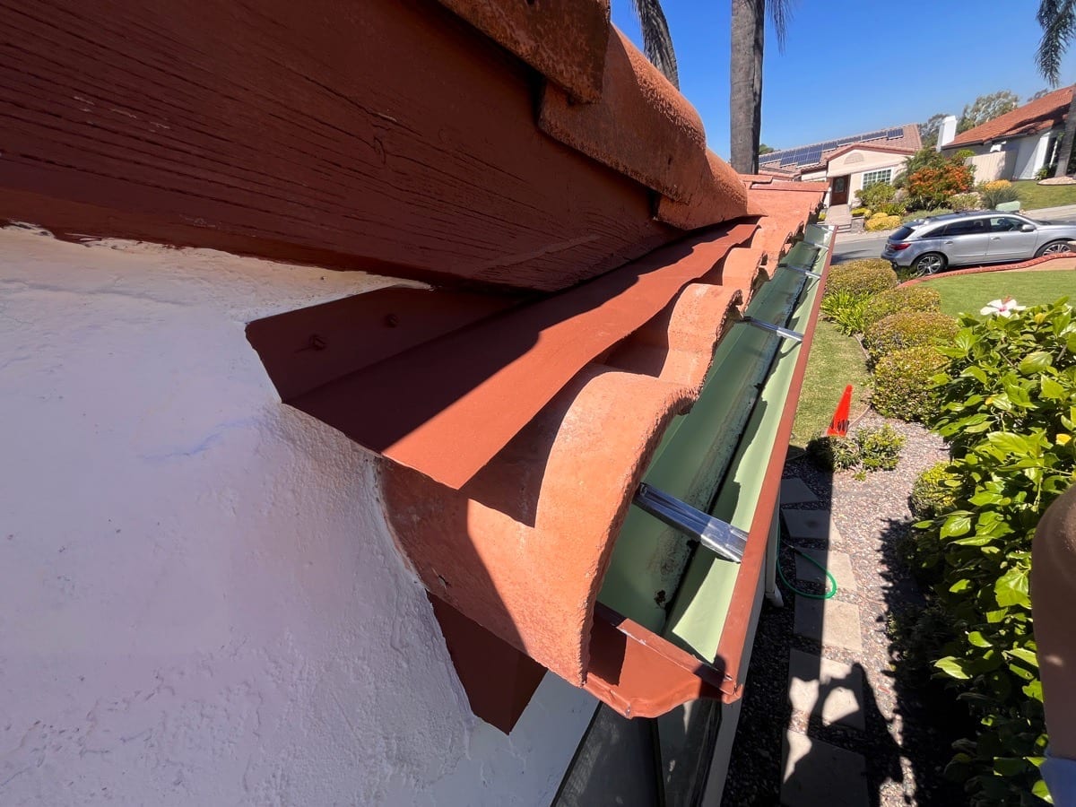Completed rolled gutter with hidden mounts documented on an AWC project
